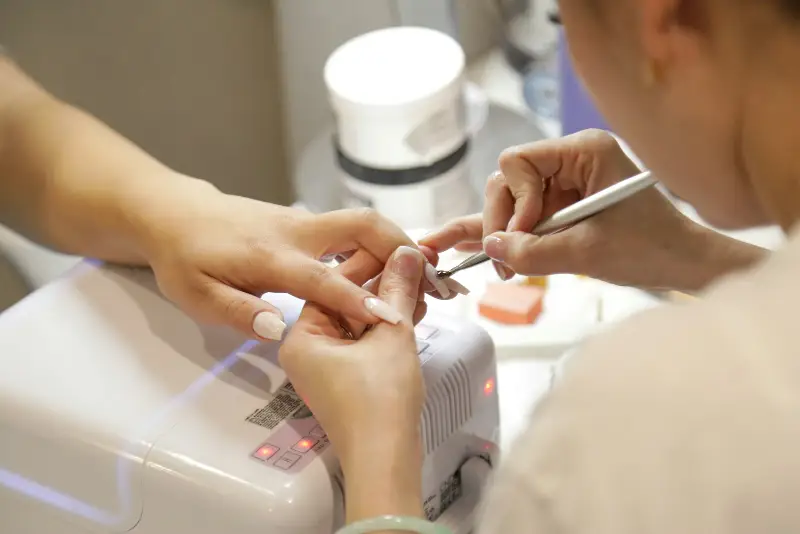 Nail work in progress at Prestige Glow Spa